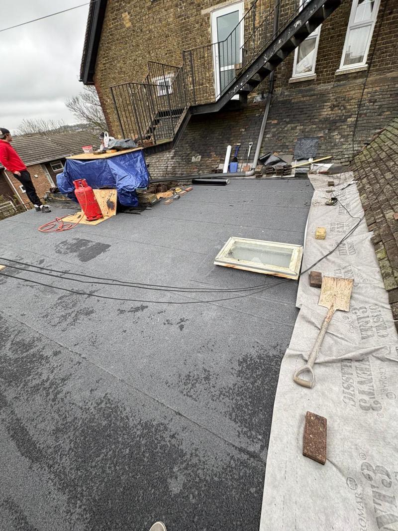 flat roof system with skylight installed in rochester 3
